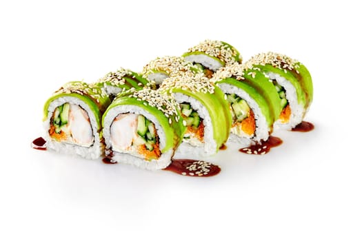 Delicious green dragon sushi rolls are presented on a pristine white background, featuring fresh avocado, sesame seeds, and a drizzle of unagi sauce