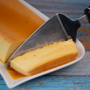Cream caramel pudding with caramel sauce on a plate, Flan, High quality photo