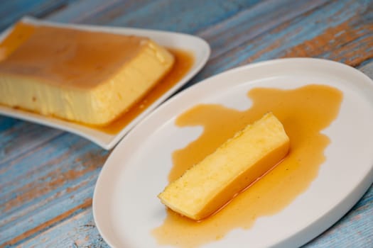 Cream caramel pudding with caramel sauce on a plate, Flan, High quality photo