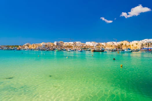 Cityscape of Marsaxlokk, a small coastal town in Malta.