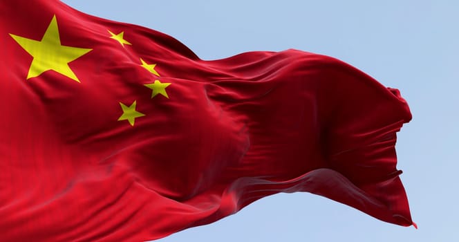 Close-up of national flag of China waving in the wind. Red background, five yellow stars. The largest symbolizes the guidance of the Chinese Communist Party. 3D illustration render. Rippled fabric