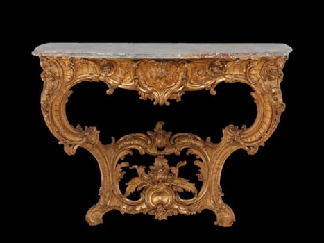 Elaborate gilded Rococo console table, German, circa 1755-60. Features ornate carvings, flowing lines, and a marble top. Evokes a sense of luxury and historical opulence.