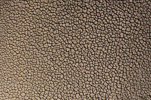 Aerial view dry and cracked earth in the reservoir at Sau reservoir, Catalonia