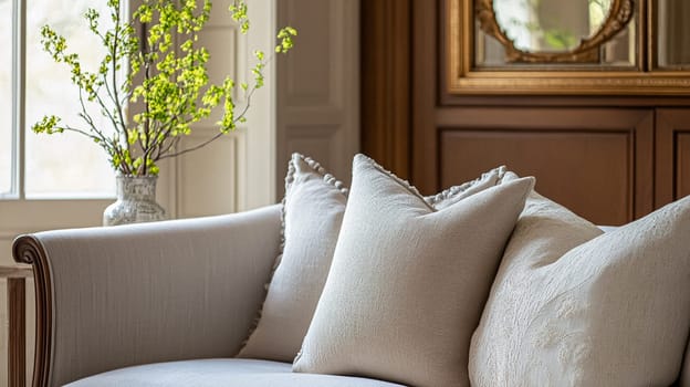 Refined English interiors with soft neutral tones, botanical art, fresh florals, classic panelled walls, and elegant furnishings for a feminine yet timeless home atmosphere