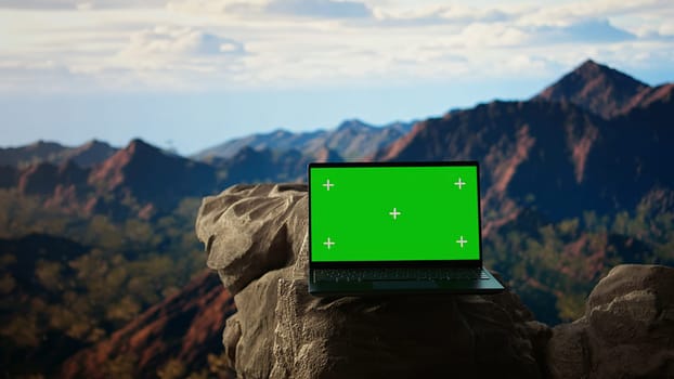 Captivating mountain escape with a rugged rocky and chroma key in the foreground. This natural beauty spot is ideal for travelers looking to experience an unforgettable wilderness adventure.