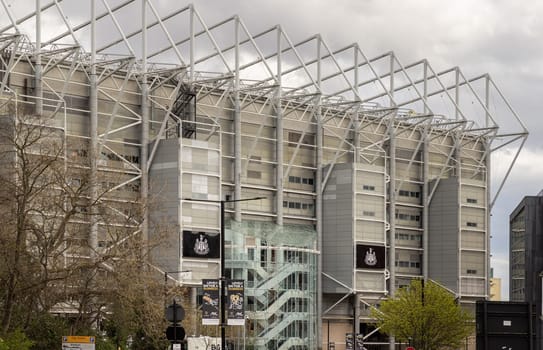 Newcastle, UK - Apr 13, 2025 - Stunning view of the steel structure of St James' Park stadium with the sky in the background. use it as your Wallpaper, Poster and Space for text, Selective focus.