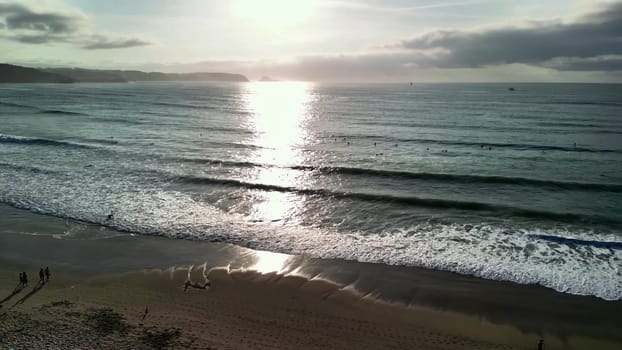 A stunning sunset reflecting on serene ocean waves, perfect for nature and travel exploration themes