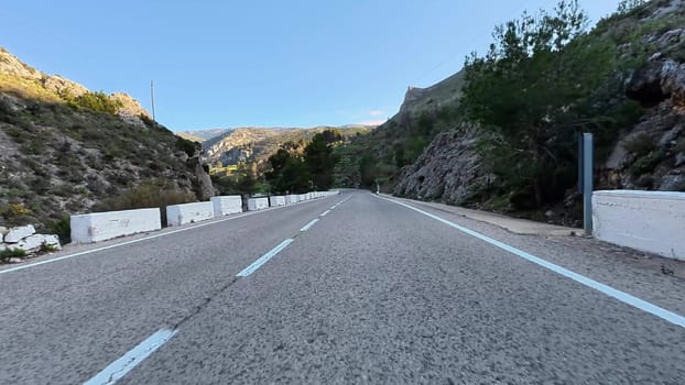 Experience an incredibly breathtaking drive through winding mountain roads that are beautifully surrounded by nature