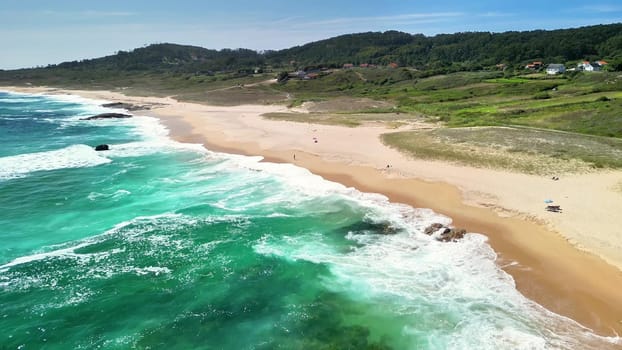 Explore this breathtaking and stunning aerial beach scene showcasing the beautiful turquoise waters and golden sands