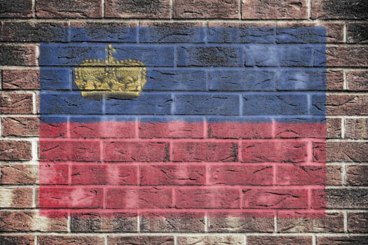 A Liechtenstein flag on brick wall background