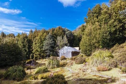 Iconic Du Cane Hut built by Patrick Joseph ‘Paddy’ Hartnett on the Overland Track is the oldest structure in the area. Photographed on a warm autumn morning in Cradle Mountain, Tasmania, Australia