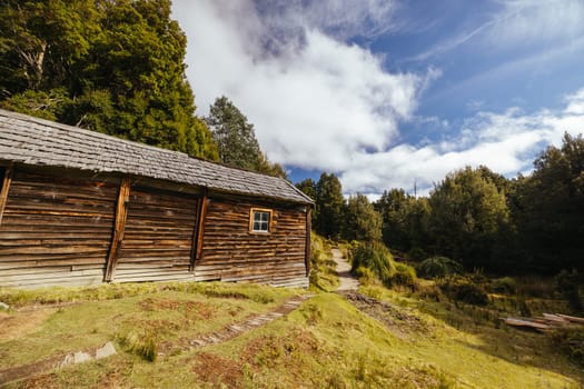 Iconic Du Cane Hut built by Patrick Joseph ‘Paddy’ Hartnett on the Overland Track is the oldest structure in the area. Photographed on a warm autumn morning in Cradle Mountain, Tasmania, Australia