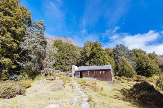 Iconic Du Cane Hut built by Patrick Joseph ‘Paddy’ Hartnett on the Overland Track is the oldest structure in the area. Photographed on a warm autumn morning in Cradle Mountain, Tasmania, Australia