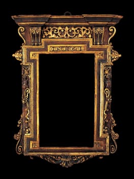 Close-up of an ornate Italian tabernacle mirror frame from South Lombardy (1550-80). Features intricate gilded wood carvings, classical motifs, and a darkened rectangular mirror. Evokes historical richness and artistic detail.