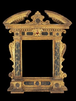 Detailed view of an early 17th-century Italian tabernacle frame from the Marches region. Features ornate gilded elements, dark textured columns, and intricate architectural details. Evokes historical elegance and artistic heritage.