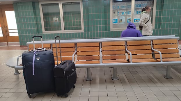October 23 2024 , Hradec Kralove Czech Republic Europe, Luggage waiting benches editorial baggs travel station people women place objects. High quality photo