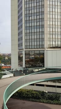 October 23 2024, Prague Czech Republic Europe, Grand Hotel, modern high-rise building, architecture city, view from the street, bridge. High quality photo Glass tower walkway editorial travel architecture