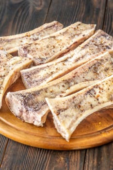 Halved bones baked to golden perfection, textures glisten with flavorful meaty depth