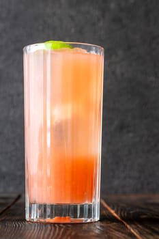 Bright guava, crisp gin, and soda fizz together in tropical refreshment