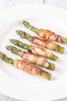 Golden bacon crisps around tender asparagus spears, savory and satisfying combination