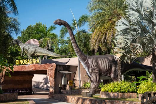 a Dinosaur Figure at the Sirindhorn Museum or Phu Kum Khao Fossil Excavation site at the Town of Sahatsakhan near the City of Kalasin in the Province of Kalasin in Thailand.  Thailand, Kalasin, December, 2024