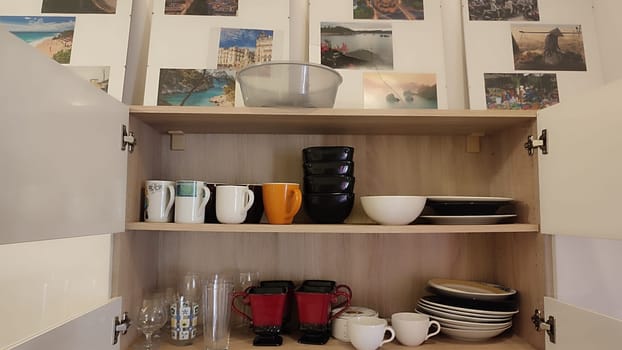 Kitchen cabinet dishes objects house hotel apartment building architecture home homemade shades place plate . High quality photo editorial objects