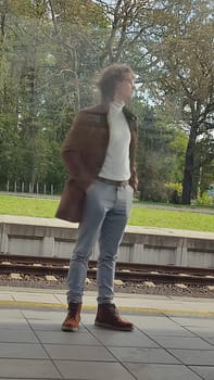 Cesca Lipa Chech Republic Europe October 18 2024 - yng men standing street outdoor travel tourism train city station platform . High quality photo