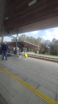 Cesca Lipa Chech Republic Europe October 18 2024 - Train station travelers people travel tourists tourism shotlisttravel editorial destination transport sign city street outdoor town . High quality photo platform place group