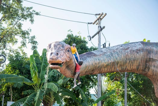 A Dinosaur Monument at a Village in Amphoe Phu Wiang in  Province of Khon Kaen in Thailand. Thailand, Khon Kaen, December, 6, 2024