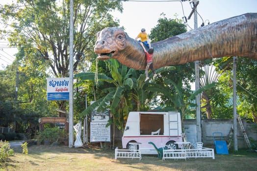 A Dinosaur Monument at a Village in Amphoe Phu Wiang in  Province of Khon Kaen in Thailand. Thailand, Khon Kaen, December, 6, 2024