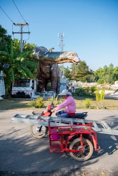A Dinosaur Monument at a Village in Amphoe Phu Wiang in  Province of Khon Kaen in Thailand. Thailand, Khon Kaen, December, 6, 2024