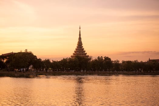 Phra Mahathat Kaen Nakhon at  Buen Kaen Nakhon Lake  in City and Province Khon Kaen in Thailand. Thailand, Khon Kaen, December, 7, 2024