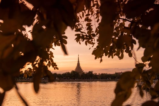Phra Mahathat Kaen Nakhon at  Buen Kaen Nakhon Lake  in City and Province Khon Kaen in Thailand. Thailand, Khon Kaen, December, 7, 2024