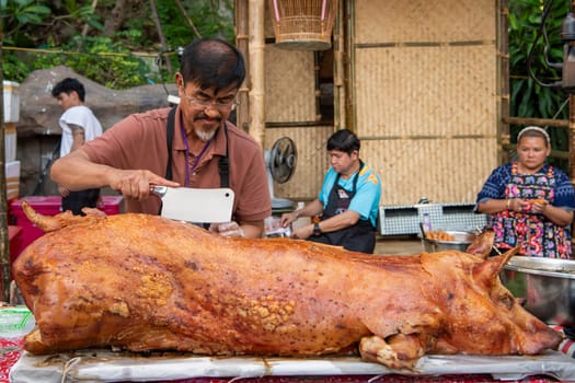 Pork meat at Thai Food Market on Wat Saket Festival Fair in Bangkok in Thailand.  Thailand, Bangkok, November, 8, 2024.