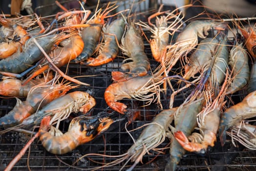 Grill Prawns at Thai Food Market on Wat Saket Festival Fair in Bangkok in Thailand.  Thailand, Bangkok, November, 8, 2024.