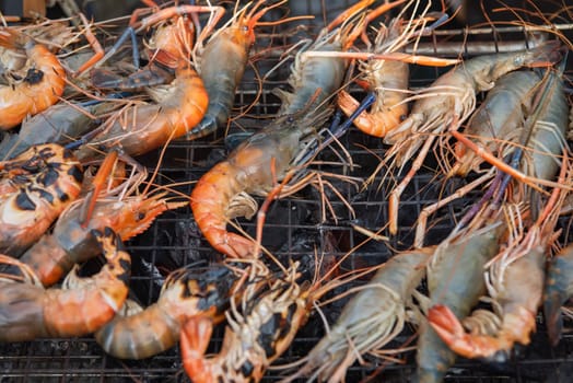 Grill Prawns at Thai Food Market on Wat Saket Festival Fair in Bangkok in Thailand.  Thailand, Bangkok, November, 8, 2024.