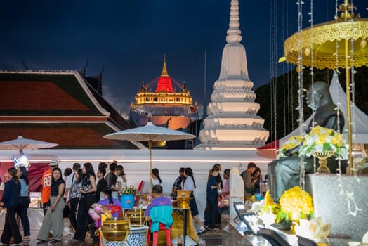 Ceremony on Golden Mount at Wat Saket Festival Fair in Banglamphu in Bangkok in Thailand.  Thailand, Bangkok, November, 8, 2024.