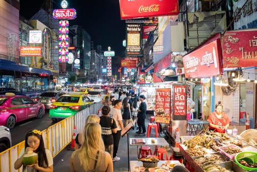 People at Night Streetmarket on Yaowarat Road in Chinatown in City of Bangkok in Thailand.  Thailand, Bangkok, November, 8, 2024.