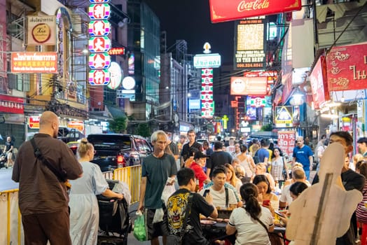 People at Night Streetmarket on Yaowarat Road in Chinatown in City of Bangkok in Thailand.  Thailand, Bangkok, November, 4, 2024.