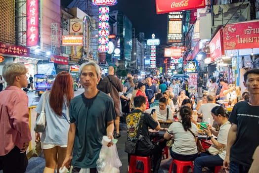 People at Night Streetmarket on Yaowarat Road in Chinatown in City of Bangkok in Thailand.  Thailand, Bangkok, November, 4, 2024.