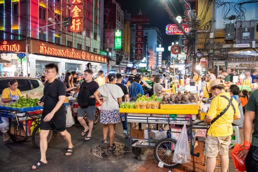 People and shops at Night Streetmarket on Yaowarat Road in Chinatown in City of Bangkok in Thailand.  Thailand, Bangkok, November, 4, 2024.