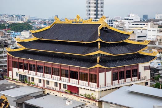 Wat Chaiyaphum Karam in China Town with skyline of City of Bangkok in Thailand.  Thailand, Bangkok, November, 5, 2024.