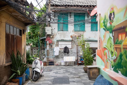 a old house in a alley in Talat Noi at China Town in City of Bangkok in Thailand.  Thailand, Bangkok, November, 5, 2024.