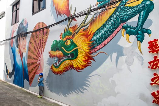 Street art and Paintings on a alley in Talat Noi at China Town in City of Bangkok in Thailand.  Thailand, Bangkok, November, 5, 2024.