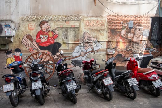 Street art and Paintings on a alley in Talat Noi at China Town in City of Bangkok in Thailand.  Thailand, Bangkok, November, 5, 2024.
