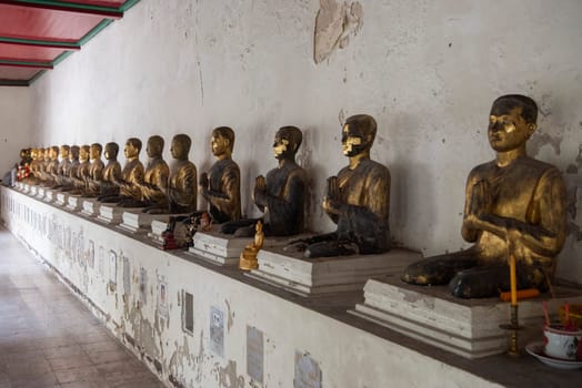 Buddha Gallery at Wat Kan Matuyaram in China Town in City of Bangkok in Thailand.  Thailand, Bangkok, November, 5, 2024.