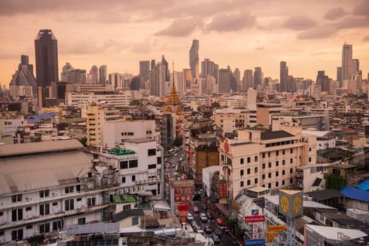 a view on Yaowarat Road in China Town with skyline in City of Bangkok in Thailand.  Thailand, Bangkok, November, 5, 2024.