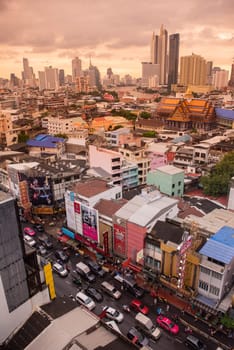 a view on Yaowarat Road in China Town with skyline in City of Bangkok in Thailand.  Thailand, Bangkok, November, 5, 2024.