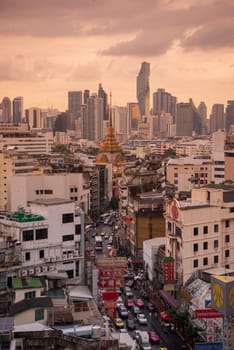a view on Yaowarat Road in China Town with skyline in City of Bangkok in Thailand.  Thailand, Bangkok, November, 5, 2024.
