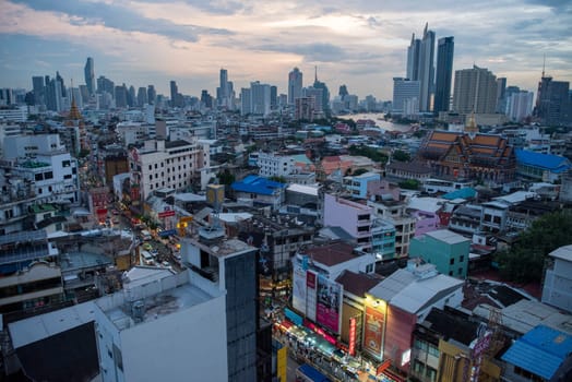 a view on Yaowarat Road in China Town with skyline in City of Bangkok in Thailand.  Thailand, Bangkok, November, 5, 2024.